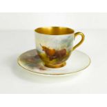 A Royal Worcester coffee cup and saucer, painted with highland cattle by Stinton, puce mark 1920,