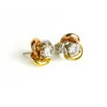 A pair of 9ct white, yellow and rose gold flowerhead earrings set with paste stones.