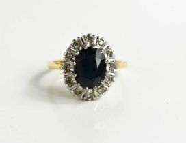 A gold (tests as 18ct) sapphire and diamond dress ring, size M, 4.16g.