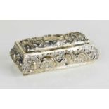 A silver trinket box, embossed with foliage and flowers, of casket form, Birmingham 1901, 3.18toz.