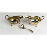 Two silver sauce boats, together with a Georgian sauce ladle.