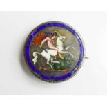 An 1819 crown enamelled and mounted as a brooch and depicting St George & the Dragon.