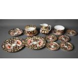 A quantity of Royal Crown Derby porcelain, comprising two bowls, two side plates, milk jug and eight