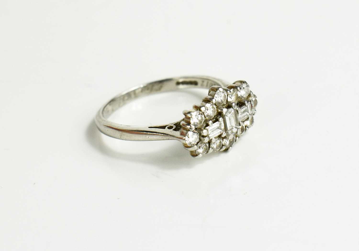 A platinum and diamond cluster ring, by Dawson of Stamford, the three baguette cut diamonds to the - Bild 2 aus 8