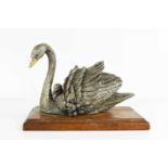 A silver model swan and cygnet, with gilded beak, by Country Artists, dated 1991, hallmarked to