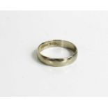 An 18ct gold wedding band, by Prouds, size O/P, 2.9g.