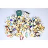 A large group of earrings and brooches some vintage to include a pair of 9ct gold and pearl screw