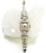 A vintage ladies platinum and diamond cocktail watch, the body and strap set with 71 diamonds,