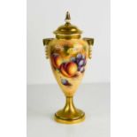 A Royal Worcester vase and cover, by Roberts, painting to the front with fruit to a mossy ground,