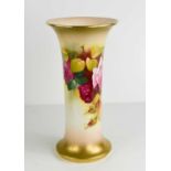 A Royal Worcester trumpet shaped vase by Spillsby, painted all over with roses, and signed, circa