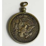 A silver half dollar pendant, 0.47toz.