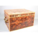 A `Colonial Furniture Company` oyster veneered drinks box, the fitted interior for four bottles