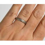 A platinum and diamond full hoop eternity ring, size N, 3.4g.