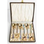 A set of silver and enamelled tea spoons by Jacob Tostrup of Norway, in the original presentation