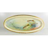 A Royal Worcester fish platter by W H Austin of oval form, painted with trout in a river, with