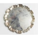 A silver scalloped edge tray, hallmarked for R. Carr, Sheffield 1994, 4.3toz