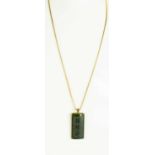 A jade and 9ct gold pendant necklace, the jade pendant carved with Chinese calligraphy, 16.7g.
