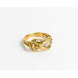 A 9ct gold and diamond set knot ring, size I, 2.6g.