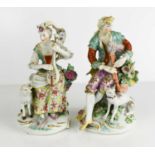 A pair of 18th century Derby porcelain figures, the Musicians, both seated, the gentleman with a