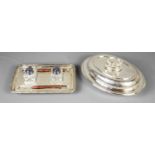 A silver plated pen and ink stand, with dedication engraving, with serving dish and cover.