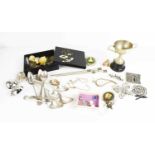 A group of jewellery and silver plateware to include a trophy, spoons, costume jewellery brooches,