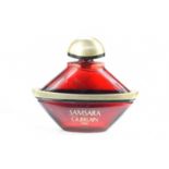 A large "Samsara" by Guerlain Paris perfume display bottle.