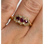 An 18ct gold, ruby and old cut diamond ring, size M ½, 2.78g.