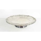 A fine silver pedestal dish, by Henry Wigfull, with intricately pierced and engraved grape and