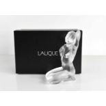A Lalique "Aphrodite" glass nude figure of a kneeling lady, signed to the base, with original box.