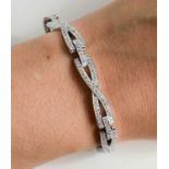 An 18ct white gold and diamond bracelet, 22.6g.