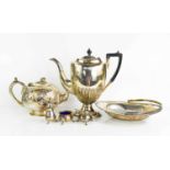 A group of silver plateware, to include a teapot, cruet set, basket form dish, and hot water pot.