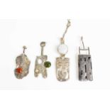 A group of four 'Studio' modernist silver pendants, including one with a necklace.