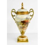 A Royal Worcester vase and cover by John Stinton, puce mark circa 1910, the twin handled trophy