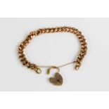 A 9ct gold chain link charm bracelet, with 9ct gold hear shaped padlock clasp, 2.50g.