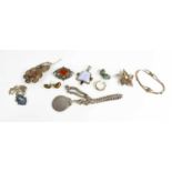 A group of jewellery to include filagree flowerhead brooch, a silver pocket watch chain and fob, two
