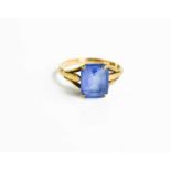 A 9ct gold and blue paste dress ring, size P, 2.6g.