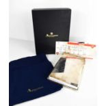 An Aquascutum of London silver plated note pad holder, engraved Arsenal V Chelsea UEFA Champions