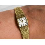 A 9ct gold cased Rotary vintage ladies wristwatch with 9ct gold strap, 29.8g.