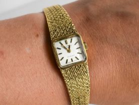 A 9ct gold cased Rotary vintage ladies wristwatch with 9ct gold strap, 29.8g.