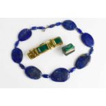 A lapiz lazuli necklace together with a 1930's Kollmar & Jourdan Art Deco rolled gold and green