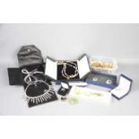 A group of jewellery to include a Danbury Mint pearl necklace with 14ct gold clasp, silver earrings,