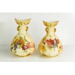 A near pair of Royal Worcester blush ivory quarter lobed coral jugs, with twin handles painted
