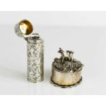 A 19th century silver scent bottle holder containing the original glass vial and stopper, engraved