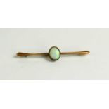 A 9ct gold and oval opal set brooch / tiepin, with steel pin, 3.1g.