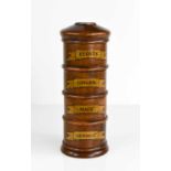 A late 19th century treen spice tower of tapering cylindrical form, with four named sections.