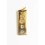 A 9ct gold ingot stamped 375, 33g.