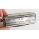 A 19th century silver case of elongated oval form, engraved with decoration and initials FF to the