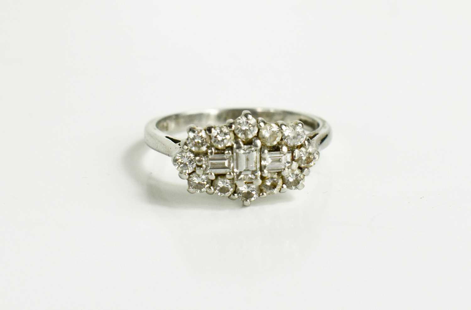 A platinum and diamond cluster ring, by Dawson of Stamford, the three baguette cut diamonds to the - Bild 3 aus 8