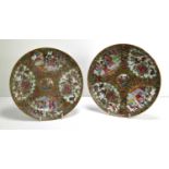 Two Chinese Canton plates painted in famille rose enamels depicting figural scenes and flowers, 24.