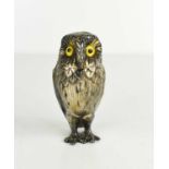 A silver salt and spoon in the form of an owl, by William Comyns & Sons Ltd, set with yellow glass